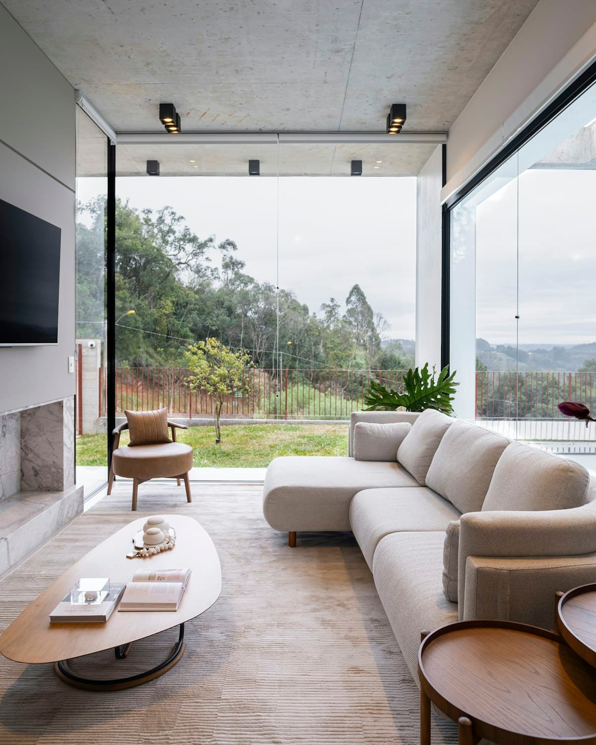 Minimalist living room in oak and white with soft daylight